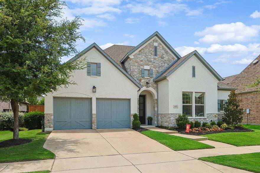 Darling Homes best selling 1 story in award winning Windsong Ranch! Upscale custom finishes and details throughout!  All 3 bedrooms with ensuite baths! Study overlooking custom pool with WIFI remote phone controls, extensive travertine, water features, spa, outdoor kitchen & fireplace! Fabulous gourmet kitchen with cabinets to ceiling, commercial Monogram range, dbl frig drawers at island, custom built pantry! Hearth dining off kitchen open to spacious great room with custom ceiling treatment!  Serene master retreat with unbelievable spa bath with free standing tub and CA custom closet w direct access to utility room. Wine sitting retreat adjacent to kitchen off main foyer. Gorgeous one of a kind home. A must see! Includes Refrigerator, Washer, Dryer, TVs in Office & Master Bath, Outdoor Grill and Backyard Furniture.