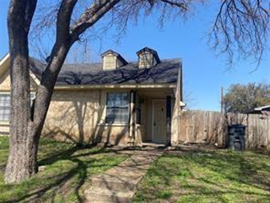 Duplex is 2 bed 1 bath. Split bedrooms and tile floors throughout. Open floor plan with vaulted ceilings in living and long breakfast bar, perfect for any gathering. Utility is conveniently located off kitchen. Primary bedroom has jack and jill entry to bathroom for privacy, featuring double vanity with plenty of counterspace, and extra storage shelving in entry hallway. Primary includes a private patio door that opens to backyard. Extra outdoor storage area located in Fenced backyard. Window coverings and patio blinds included. Off street parking for two vehicles.