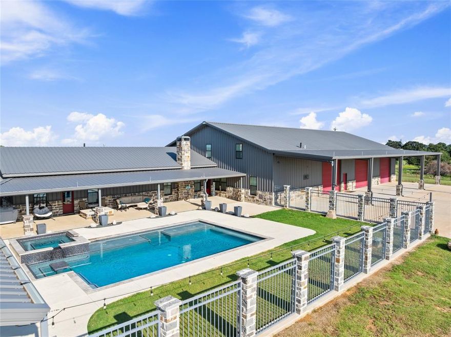 Welcome to your luxury country estate in Boyd, Texas—where modern comfort meets wide-open space and endless opportunity. Situated on 11.9 fully fenced, Ag Exempt acres, this exceptional property offers privacy, versatility, and a true Texas lifestyle. Looking for your own slice of paradise? Skip the fuel stops—this property includes on-site fuel tanks ready to keep you going—and even comes with your very own longhorns to help maintain your ag exemption. The custom-built home spans over 4,000 square feet, blending rustic charm with modern finishes and thoughtful design throughout. The property is anchored by an impressive 60x80 shop featuring AC and heat, living quarters, floor drains, and expansive space for equipment, RVs, vehicles, hobbies, or business use. Outdoors, enjoy a resort-style pool with heater and chiller, a poolside bar, and a pavilion with RV hookups—perfect for entertaining or relaxing under the stars. Additional highlights include a storm shelter, stocked pond, and water filtration system.
Furniture is negotiable, and farm equipment is available, creating a potential turnkey opportunity. Whether you're looking for a private retreat, entertainment property, or versatile homestead, this one delivers. Experience modern country living at its finest. TXT keyword Lonestar1 to 88000 for more photos and video.