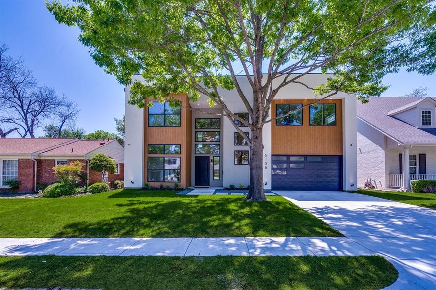 For the first time in East Dallas, welcome home to this Avant Group Modern in Wilshire Heights featuring an Elegant Kitchen w Custom Cabinets & Sub Kitchen Pantry w Desk & Coffee Bar, 10ft Island, 48in Built-in Café® Fridge, Café® 6-Burner Range, Bar w Wine Cooler & Wooden Floating LED Shelves. Inviting Foyer w Modern Lighting, Open Dining Area w lots of natural light, Real Hardwoods, Steel & Glass Entry Door & Backyard. Ground Floor Features a Guest Bedroom w ensuite Bath, Powder Bath & Mud Room Primary Suite on Second Level w Floating Dual Sink Vanity, Makeup Vanity, Vessel tub, Large Spa-like Rainfall Shower & Enormous Closet. 2nd floor also features 2 spacious Bedrooms w Ensuite Baths & Game Room w Wet Bar & Closet. Exterior is real Concrete Stucco & Wood. Includes Control4® Smart Home w Smart Lights, wired w CAT-6E Internet, wired for Speakers & Cameras, Piered-slab Foundation, & Foam Insulation, 2 Tankless Water Heaters. Includes Maverick® 1-2-10 Builders Warranty *3D Tour*