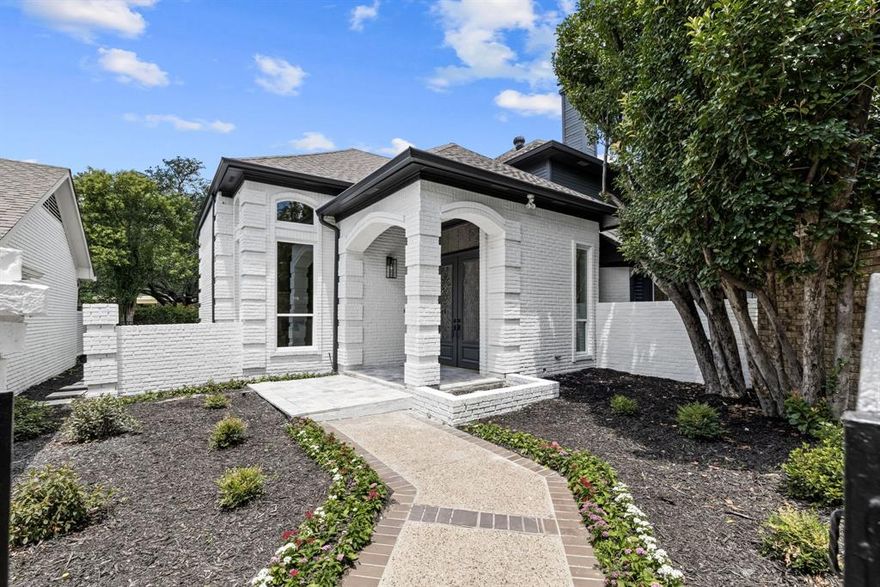 Tucked inside the prestigious, guard-gated Glen Lakes community, this impeccably and completely renovated 4,482 sq ft residence offers refined living in one of Dallas’ most coveted enclaves—just moments from Central Expressway, NorthPark Center, and the city’s premier dining and shopping destinations.
Step inside to soaring 20-foot ceilings and a dramatic, light-filled living area anchored by one of two beautifully appointed fireplaces. Designed for entertaining, the home features two built-in wet bars and a stunning dual-island kitchen with custom cabinetry, designer lighting, and sophisticated wallpaper accents. Throughout the home, curated tilework and exquisite flooring selections further elevate the interiors with subtle yet striking detail.
The spacious primary suite, located on the main level, is a luxurious retreat with a spa-inspired marble and granite bath. Enjoy a freestanding soaking tub, an oversized double walk-through shower, his-and-her water closets, and a couture-worthy custom closet.
Upstairs, a versatile flex space offers endless possibilities—whether as a home office, media room, playroom, or private fitness studio. Three secondary bedrooms, each with sleek, modern en-suite baths, provide comfort and style for family or guests.
Additional highlights include a charming breakfast nook with built-in window seat storage, a well-appointed utility room with custom built-ins, and an epoxy-coated two-car garage. Residents enjoy access to private walking trails and a community pool—all within a secure, lock-and-leave setting in the heart of Dallas.