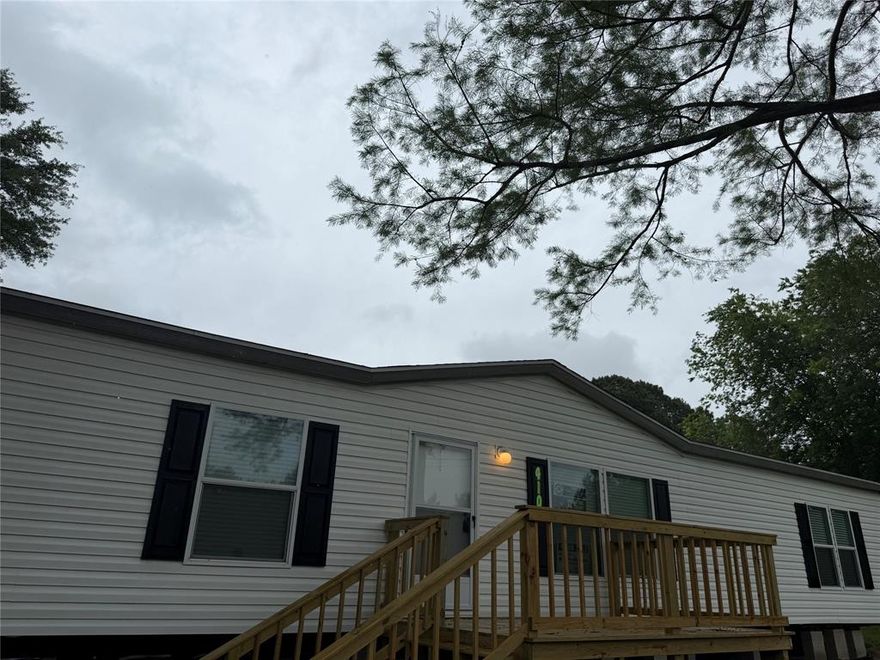 This 2025 4 bedroom, 2 bath home features a split floor plan and an open, inviting layout that feels like new, with all kitchen appliances included for easy move-in.  The kitchen flows seamlessly into the dining and living areas--perfect for family gatherings or entertaining. The guest bathroom with a shower-tub combo, three guest-kids' bedrooms, and a welcoming master suite with its own bath.  Large laundry room. Luxury vinyl flooring in main area of the home. Nice shade trees on the lot and a patio in the back yard to enjoy nature.