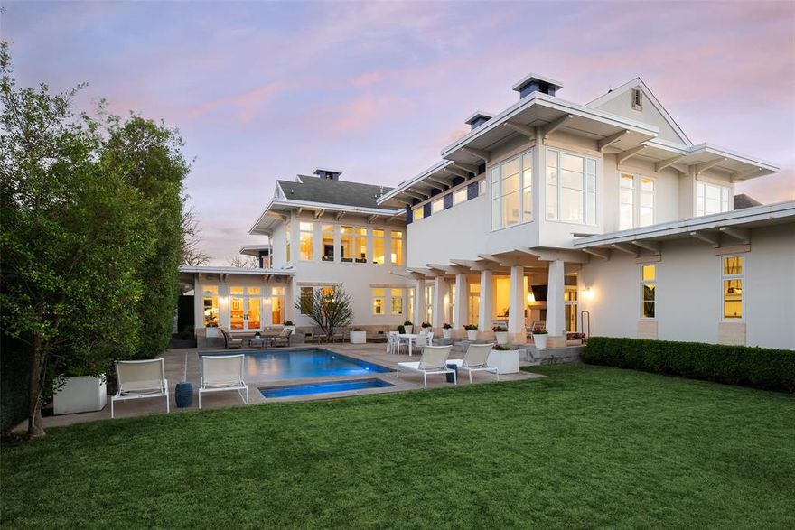 This innovative interpretation of the classic Craftsman home at 6215 Norway carries an air of the resort lifestyle of the Hamptons or Seaside, Florida. Chosen for the AIA Dallas Home Tour in 2023, it is one of only a handful of homes with a private access gate to the St. Mark’s campus. The convenience and privacy this location offers are truly exceptional. Designed by architect Michael Malone and built by Manning Snelling, the 6,886 square foot, 5 bedroom, 6.1 bathroom residence is set on an extra-deep 100 x 200 lot. Malone drew inspiration from C.F.A. Voysey, and Frank Lloyd Wright to create this timeless look. Thick tapered columns, and the large gabled front porch, create an immediate sense of invitation. A blue frieze line of tile at the top of the offers a memorable design element. An environmentally sound home, each major interior space has a corresponding exterior area, allowing for a continuous flow of light. A uniform set of finishes, including Carrera marble and white oak floors, is used throughout the house. Traditional and modern elements are beautifully balanced. Classic open living and dining rooms offer a unique twist, a grid pattern as a unifying design motif. The decorative grid paneling continues in the two-story family room, where a butler’s pantry and a wine room are tucked behind the open-plan kitchen. The primary wing ceiling extends the grid pattern in a streamlined industrial touch, with French doors opening to the pool. The principal bathroom is wrapped in marble with a large shower and a vessel tub. Upstairs are four generously sized ensuite bedrooms – two that offer incredible panoramic views onto St. Mark’s campus.  A playroom and exercise room complete the upstairs. With 1,200 square feet of outdoor living space, featuring a covered patio with a fireplace and grill station, a large grassy area, and a pool and spa, this is an ideal environment for both daily living and entertaining. A 3-car garage with room for lifts completes the home.