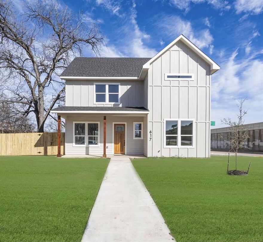 Stunning New Construction with Modern Farmhouse Charm! This beautifully designed two story home offers 4 bedrooms, 3 full bathrooms, and approximately 1,966 sq ft of thoughtfully crafted living space. Featuring an open concept layout, high ceilings, and abundant natural light, this home blends modern style with everyday functionality. The main living area flows seamlessly into a designer kitchen showcasing a large quartz island, custom cabinetry, stainless steel appliances, elegant pendant lighting, and ample storage perfect for entertaining and daily living. Luxury vinyl plank flooring and modern fixtures elevate the space throughout. The primary suite serves as a private retreat, complete with a spa inspired bathroom featuring a freestanding soaking tub, dual vanities, premium finishes, a large walk-in shower with custom tile work and a large walk in closet. Additional bedrooms are generously sized and well-appointed. Additional highlights include a dedicated dining area, upstairs living space, energy efficient features, a 2-car garage, side extended driveway. The Property is sitting on a .25 acre approximately 11000 sqft corner lot. Conveniently located near downtown Fort Worth, major highways, dining, and shopping. Move in ready and built with quality craftsmanship this home is a must see.