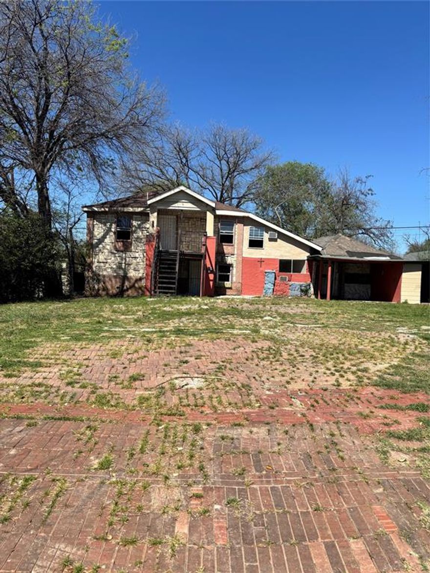 INVESTORS DREAM! Duplex being sold as is. 4 bedrooms, 2 bathrooms. Great for rental or investment. The garage has been converted to a third apartment. No HOA.