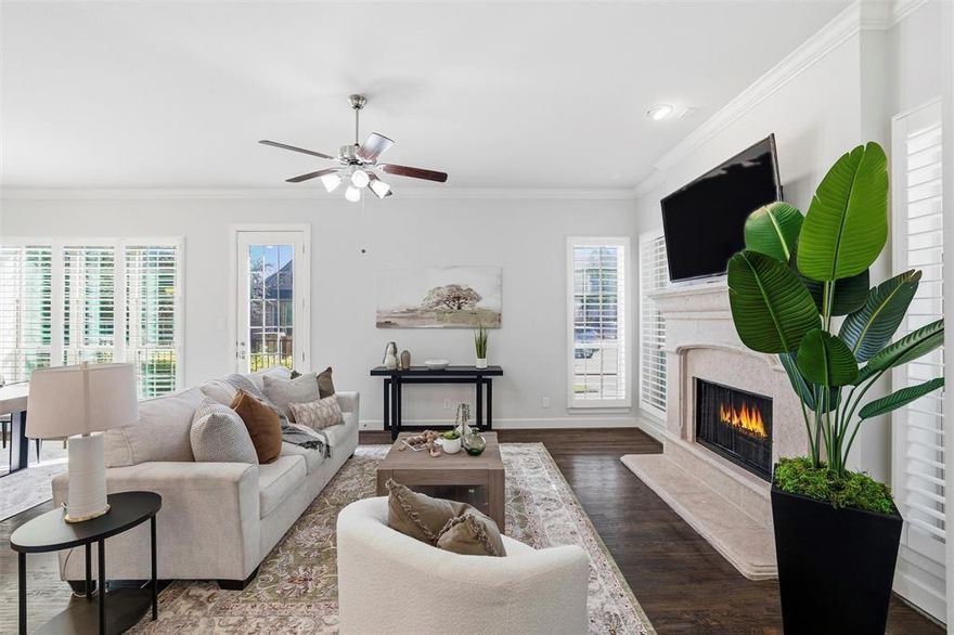 Welcome to 2533 Lady Amide Lane, an executive-style home in the gated community of The Reserve at Castle Hills. This 4-bedroom, 3.5-bath, 3,317 sq ft home offers luxury, space, and comfort in one of Lewisville's most desirable neighborhoods. Featuring an open floor plan with rich wood floors flowing through the main living spaces, this home is both low-maintenance and energy-efficient. The gourmet kitchen is a chef’s dream with white cabinetry, granite countertops, a gas cooktop, stainless steel appliances, and a large island perfect for entertaining. The spacious primary suite is located downstairs and includes a spa-like bath with dual vanities and a huge walk-in closet. Upstairs you'll find three oversized bedrooms, a game room, media room, and built-in desk area with storage—ideal for work or study. The community features a pool, private park, and scenic walking trails around a pond with a fountain. HOA includes front yard maintenance, basic cable, and security monitoring.