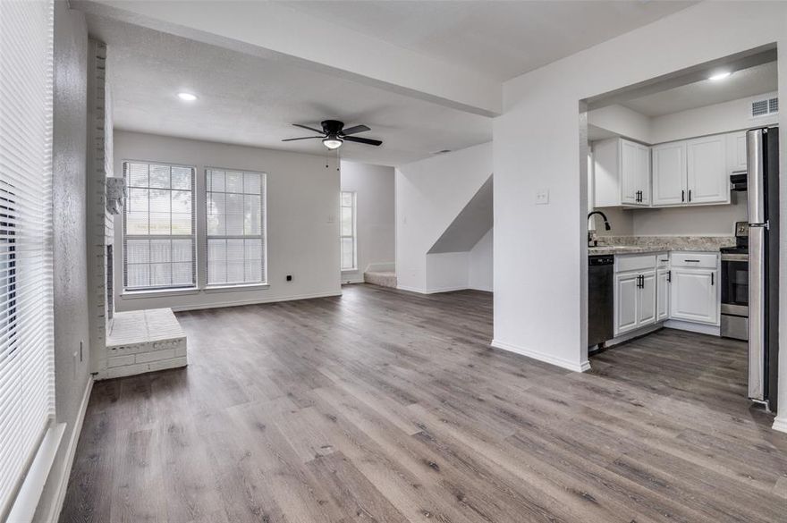 Updated and move-in ready townhouse in convenient Arlington location. Bright open living area with fireplace, updated flooring, refreshed kitchen with stainless steel appliances, spacious bedrooms, updated baths, and private fenced outdoor space. Clean, modern feel throughout with easy access to shopping, dining, and major highways. Buyer and buyer’s agent to verify all information, including schools, square footage, and measurements.