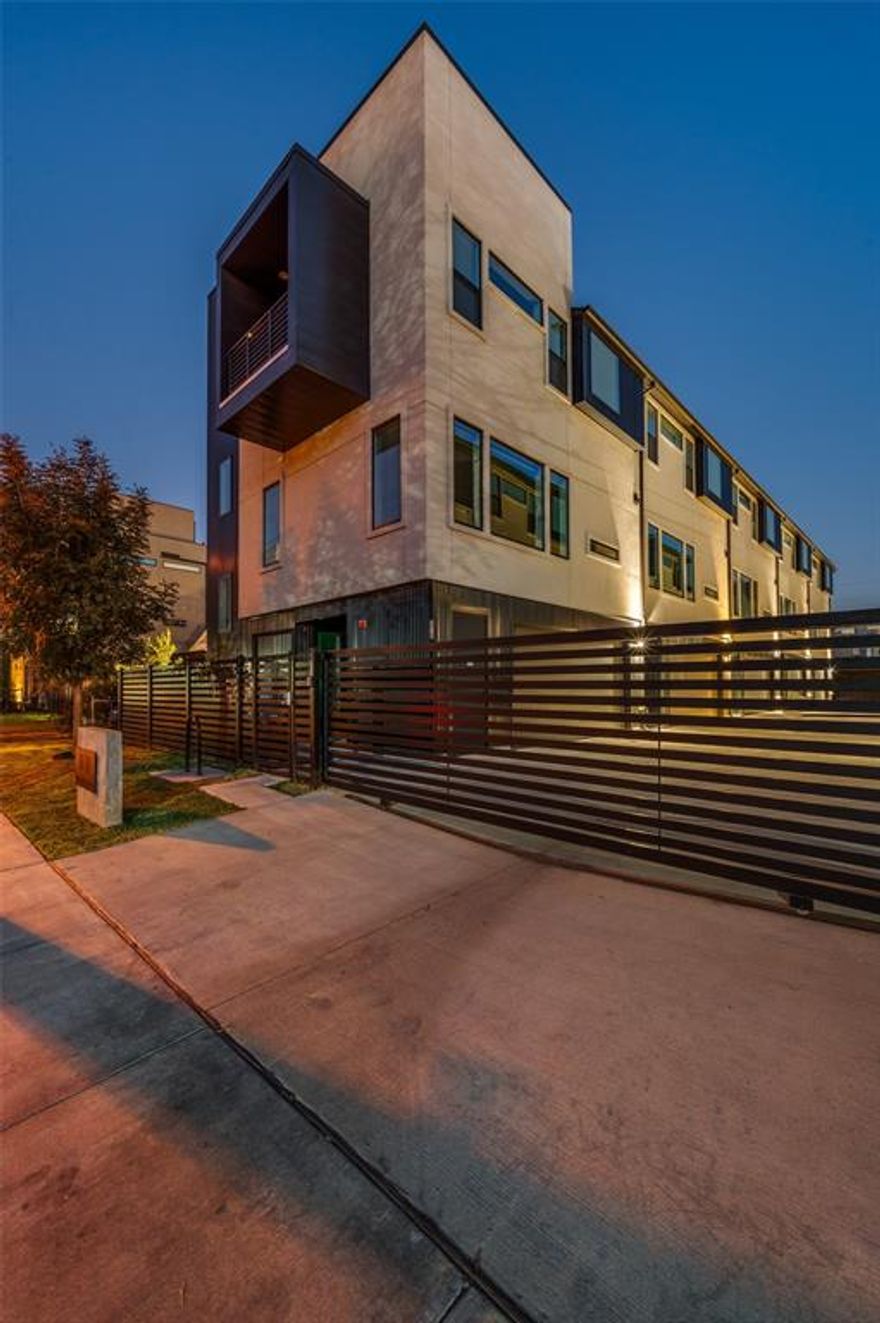 ***NEW CONSTRUCTION***** Discover this gated, modern, townhome-style condo in the heart of West Love-Medical District with rooftop views over looking the city! This chic property features 2 bedrooms, 2.1 bathrooms, a private fenced backyard, stunning white oak hardwood floors, and high-end designer finishes throughout. The open-concept kitchen boasts a large island, stainless steel appliances, quartz countertops, and one-of-a-kind custom cabinetry, seamlessly connecting to the spacious living and dining areas—perfect for entertaining. The luxurious primary suite impresses with vaulted ceilings, a walk-in closet, and a spa-like ensuite bath complete with a freestanding bathtub, dual sinks, and a large walk-in shower. The secondary bedroom also offers its own ensuite bath and walk-in closet for added convenience and privacy.