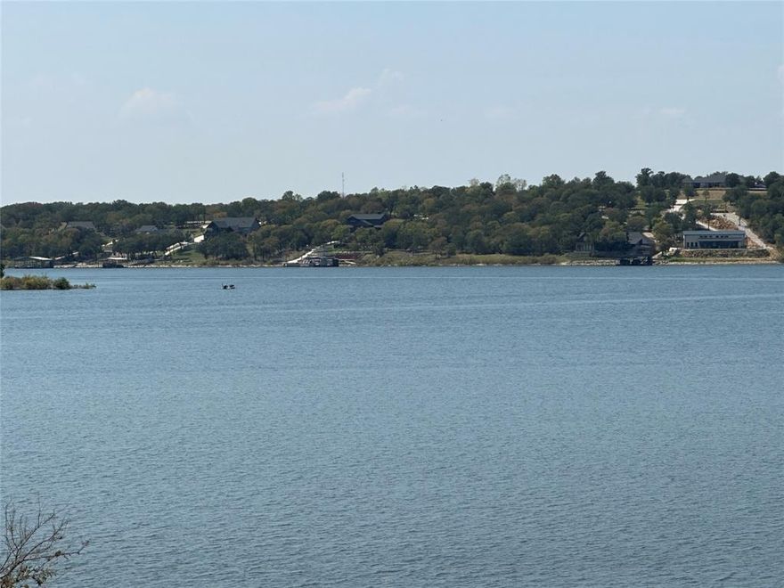 The Youngblood Ranch at Bridgeport Lake is an opportunity of a lifetime!  As you drive into the ranch you’re greeted by a high elevation with scattered live oak, mesquite and loads of character.  Driving through the upper portion of the ranch you traverse down to a variation of lake front acreage from deep water elevations to a private cove with beach access for an angler’s fishing dream with over half mile of water access.  Graveled roads and trails wind throughout the rugged character of property that is surveyed into four tracts giving the property potential for future development.  There are electrical lines run into the ranch with some meters already in place.  The uniqueness of this property being bordered by the Tarrant Regional Water District and two large neighboring ranches makes it one of a kind. There is a large lake that borders the TRWD with another hilltop building site with scattered oaks and massive lake views! With so many potential home sites the possibilities are endless for a multi family estate. Truly a multi use property with a abundance of wildlife that ranges from white tail, turkey, and other native species creating a habitat suited for hunting and fishing. Native grasses suitable for cattle and currently under Ag Exempt. Whether you’re looking for a legacy ranch retreat or a investment property, this one checks all the boxes!  Call agent for private viewing.
