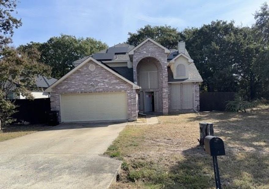 Awesome Lake Tawakoni home in the Indian Oaks Subdivision. This great home sits on a spacious corner lot and has great potential to be an amazing property. This is a 4 bedroom, 2 bath home just minutes from Lake Tawakoni. The oversized 4th bedroom can also be used as a second living or bonus room. Large main suite with garden tub, large walk-in shower, and walk-in closet. Backyard backs up to a large heavily treed lot and offers a lovely, covered porch with a hot tub, built-ins, extra storage and workshop with electric. HOA offers a boat ramp, community dock and park. Come take a look at all this home has to offer. Sold AS-IS.