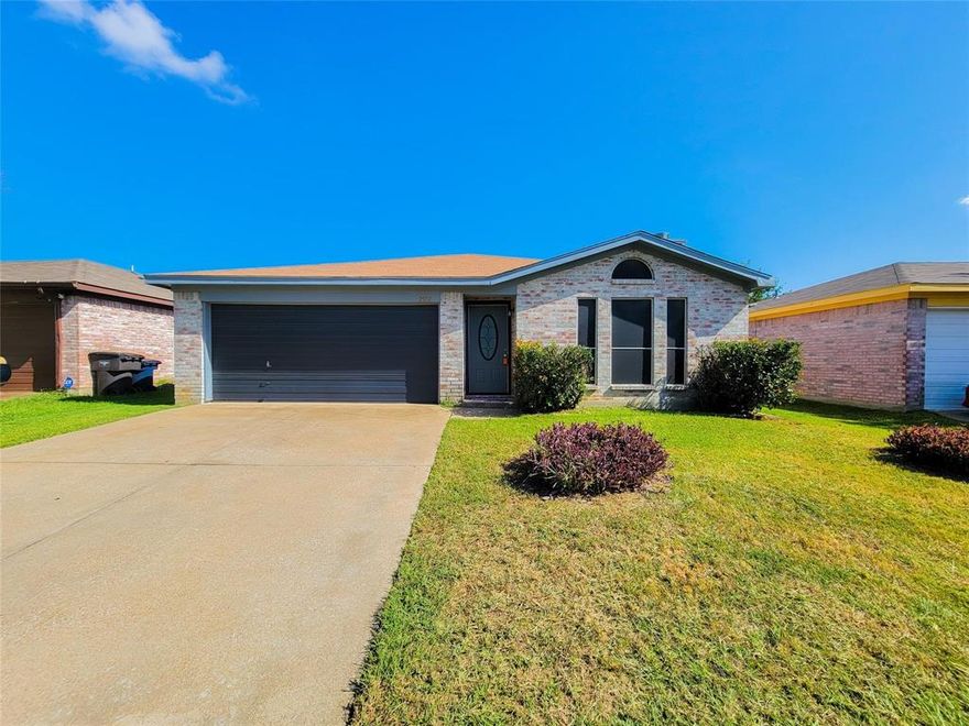 MOVE IN SPECIAL!!!  Welcome Home....this beautiful home is ready to go.  The home features 3 bedrooms with spacious closets.  There are gorgeous laminate floors in the whole house.  The living area is large with vaulted ceilings and features a wood burning fireplace.  The home has been updated.  The yard is large and has a wood fence.  Come add your personal touch to this loved home!  This home is ready for you to make it your home.  Convenient access to major freeways, shopping, and entertainment.