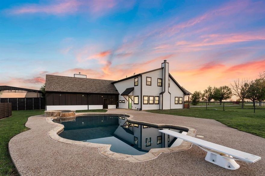 Priced below appraisaed value! This beautiful, turnkey 4-bedroom, 3-bath farmhouse offers the perfect blend of country living and contemporary convenience. Nestled on 4.59 scenic acres, this homestead-ready property features NO HOA and endless opportunities to enjoy the outdoors and live off the land. Whether you're dreaming of a hobby farm raising chickens or livestock, starting a garden, or simply embracing a self-sustaining lifestyle, this property provides the space and versatility to make it happen. Entertain year-round with a spacious covered and screened-in patio, complete with a built-in BBQ and outdoor kitchen, living area, and a decorative stone fireplace. Inside, a cozy wood-burning fireplace adds warmth and character, while the chef's kitchen, gas stove with propane, and double ovens make meal prep a breeze. The open-concept layout is both functional and inviting—ideal for everyday living and hosting guests. Step outside to your private retreat featuring a sparkling pool and spa, barn, workshop, a garage with car lift, a she shed, a second shed for additional storage, and a peaceful pond—perfect for relaxing after a long day. Whether you need space to work, store equipment, raise animals, or cultivate a garden, this homestead property has it all. Don’t miss your chance to own this fully updated farmhouse—a true country escape with all the modern touches and the freedom to live your homesteading dreams!