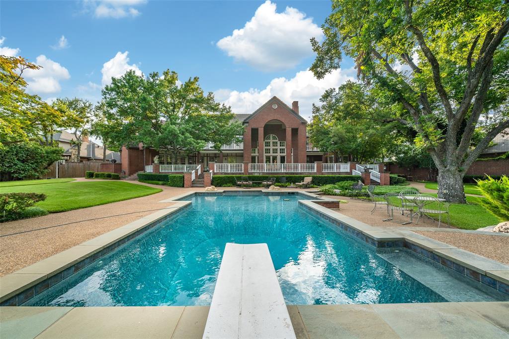 Rare opportunity to own an incredible entertainers delight, gem in Williamsburg Estate, situated on 1.12 acre, backs to Bert Fields park and White Rock Creek. Tudor inspired with presidents driveway, over sized gated driveway parking. Step into a grand foyer, beautiful wood floors, opulent formals for hosting with french doors that open out to a grand twin stair balcony, enjoy a picturesque view of manicured grounds, pool, cabana and spa off master. Home has 2 story rich paneled study, hidden rooms, beautiful kitchen, breakfast and family room, 2 rooms w baths, lots of storage, grand master suite with 2 walk in closets, wine grotto, 4 rooms up with attached baths, media, separate entry nanny quarters, more...