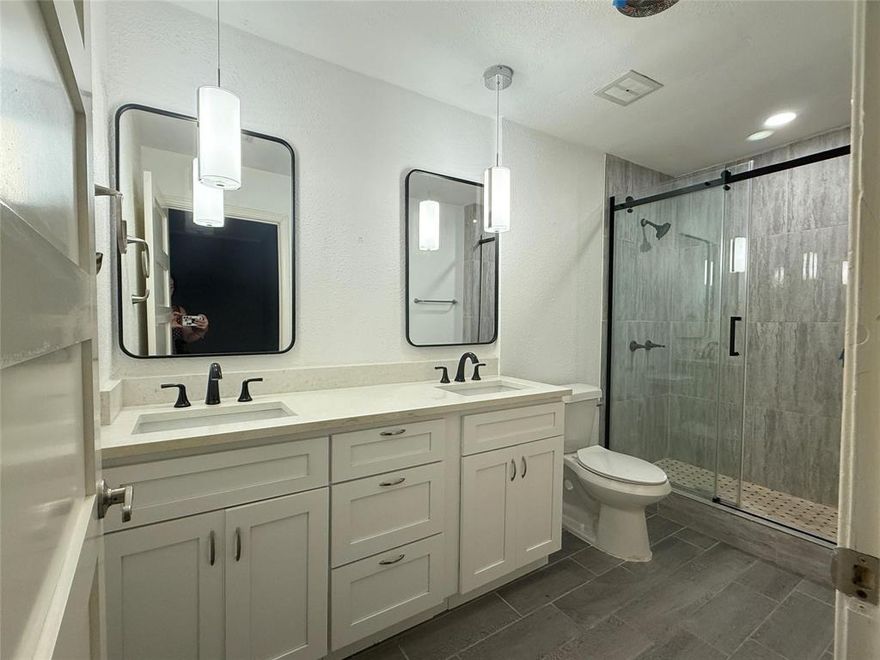 No HOA! This beautifully updated one-story ranch-style home is ideally located next to a serene greenbelt and offers picturesque views. Featuring an open floor plan, the residence provides spacious living areas along with a bright sunroom, perfect for entertaining or hosting guests. A covered patio extends the living space outdoors, creating a relaxing environment to enjoy nature. All bedrooms have been newly renovated, ensuring a move-in ready experience. Conveniently located near major highways and shopping, this home combines comfort, style, and accessibility.