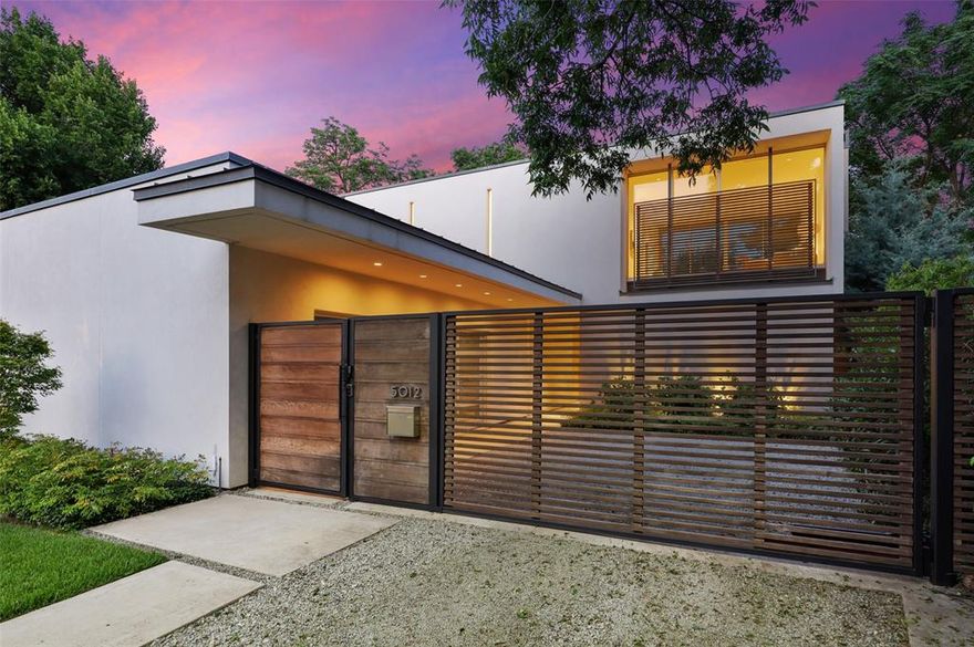 Discover sophisticated living just minutes from downtown, where style and functionality merge seamlessly. Perfectly positioned on a one-third-acre lot, this architecturally designed home offers the ultimate in privacy, security, and convenience, an urban retreat that feels like a hidden oasis. Step inside and experience an airy, open design with gallery-style walls for your art collection, light-filled living spaces, and entertainment-ready areas both indoors and out. From the sun-drenched second-floor primary suite, you’d never guess you’re only five minutes from the vibrant city center.
This home is as solid as it is stunning, featuring. Engineered pier and beam foundation, Lennox high-efficiency HVAC, Structured wiring with Lutron Smart Controls, Low-E thermal windows, Oversized garage with Tesla charger + Ipe wood decking & French drain system. The culinary kitchen is a true showstopper, crafted for both beauty and performance. Outfitted with Poggenpohl European cabinetry, Miele appliances, and Neolith porcelain counters, it provides a sleek, modern look with exceptional durability. A hidden butler’s pantry adds extra storage and a perfect staging area for entertaining. Additional highlights include: Full suite of Miele appliances: convection oven, 5-burner gas cooktop, double wall ovens, speed oven, counter-depth refrigerator, wine cooler, and in-drawer refrigeration.  Automated solar shades & smart lighting with Lutron Home Control. Tankless gas-fired water heating system. Outdoor covered living space with Lynx gas grill, refrigerator, sink, fireplace, and full shower bath. Heated pool designed for laps, lounging, or even a game of volleyball. This property is a rare opportunity to own a contemporary masterpiece in one of Dallas’s most sought-after locations.