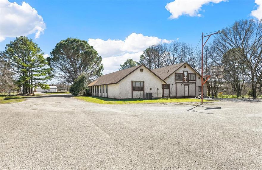 Heavy Commercial Zoned Building, previously used as a church. Currently being used as a commercial office space. City water, city sewer, large acreage. Great location for a redevelopment.