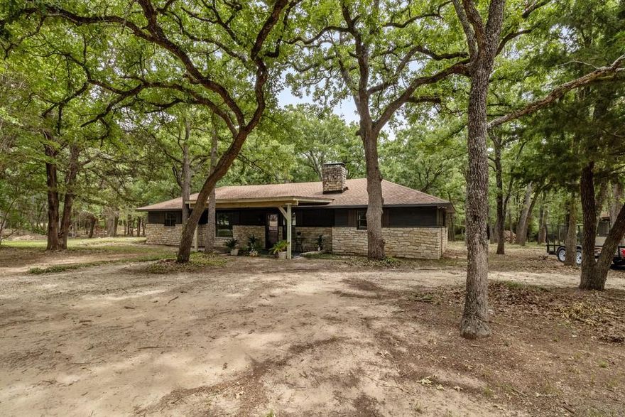 One-of-a-Kind Country Oasis on 5.63 Acres – Within Corsicana City Limits!  Discover the perfect blend of peaceful country living and city convenience in this beautifully updated 3-bedroom, 2-bath home. Set on 5.63 acres, this rare gem includes a detached garage, extra storage, and plenty of space for your animals—bring the horses and chickens!  Tucked away in a quiet, private setting inside the city limits of Corsicana, you're just minutes from restaurants and shopping.  Home to the Navarro College, and Richland Chambers Lake—the 3rd largest man-made lake in Texas. Centrally located less than an hour from Dallas, this property offers the best of both worlds.
The home is energy-efficient and budget-friendly, featuring wood burning fireplace, covered porches and solar panels that are fully paid off and free of liens. Wood Whether you're looking for a serene retreat, hobby farm, or just room to roam, this property checks all the boxes for country living with city perks.  Call today for your private tour of this beautiful property.