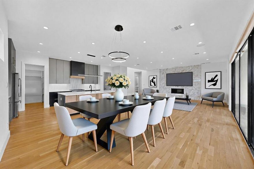 Gorgeous Modern Contemporary home in sought after MIdway Hollow built by The Avant Group.  This 5 bedroom 5 Bath home has an inviting curb appeal with a modern flair throughout.  Downstairs, the home features an open design with combined kitchen-dining-living areas,  a large primary bedroom suite and an office or guest bedroom.  The kitchen is nicely appointed with Bertazzoni gas range-oven and Dishwasher, wine cooler, large butler’s pantry, and connected mud room with ample storage.  The primary bedroom suite offers a spa-like retreat with a tub, large shower,  and huge closet that opens to a laundry room.   Upstairs offers 3 bedrooms with bathrooms en suite- with one room wired for a home theater- and a second living area with an outdoor balcony.  Other features include a smart home wired closet, Novo water conditioner, spray on foam insulation, floored attic storage, and an electric vehicle charging outlet in the garage.  Light and bright, elegant, and an excellent location in one of Dallas’ most sought after neighborhoods.