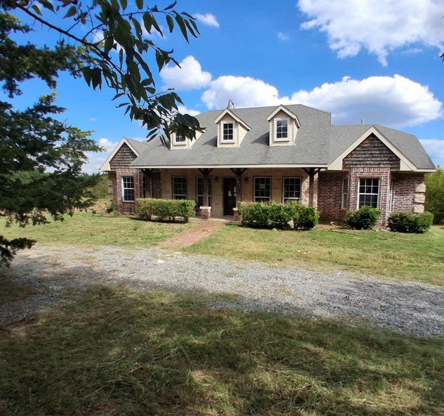 Enjoy a quiet country living!! A beautiful Austin Stone and Brick home with great curb appeal. Circle driveway, large cozy front porch and a private setting on a 2 acre lot w creek. Its a 4 bedroom 2 bath and the office could make a 5th bedroom or formal living area! Has an eat in kitchen with a large breakfast bar, granite countertops and appliances. Large open living room with fireplace and separate dining room. 2nd floor has a large game room with separate bedroom or hobby room. Split bedroom floor plan and more. A must see just 1 mile from Hwy 78! Come check it out before this great home is gone! Sold As-is