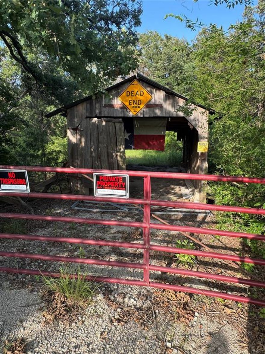 This property is a MUST SEE. Directly off of FM 80, this 12 acres is tranquil and secluded. This slice of heaven would be a hunters paradise or the perfect place for those wanting the privacy of rural living without a long commute to civilization. Call today for a showing!