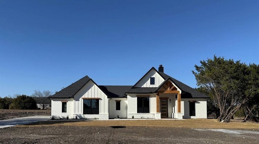 ***************$10,000.00 Seller credit for buyer's closing cost****************

Escape to a peaceful country retreat with this stunning 4-bedroom, 2.5-bathroom farmhouse on a sprawling 1.048-acre lot.

The home features an open-concept design that flows seamlessly into a gourmet kitchen, perfect for entertaining. The kitchen is a chef's dream with high-end appliances and ample counter space.

Retreat to the luxurious primary bedroom suite, a true sanctuary with a spa-like bathroom that includes double vanities, with separate shower, a relaxing garden tub, and an extra-large walk-in closet with vanity.

Enjoy outdoor living with a spacious covered patio complete with a built-in grill and sink, pathway to your fire pit, ideal for winter and summer barbecues and gatherings. The property is just a 8 min drive to Hamm Creek Park, where you can enjoy fishing, boating, and stunning views of the Brazos River. This home offers the perfect blend of country living and convenient access to outdoor recreation.

The Builder has additional lots here and multiple floor plans. Call listing agent for more info!!