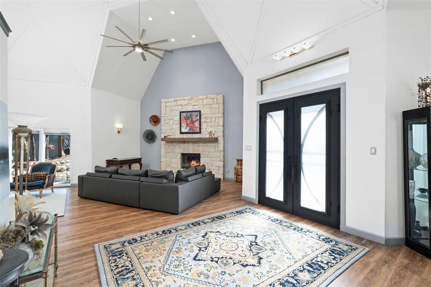 REDUCED PRICE! Step into something truly special with this one-of-a-kind geodesic dome retreat, where architectural flair meets modern luxury. From the moment you arrive, custom iron-and-glass entry doors set the tone for what’s inside—dramatic soaring ceilings, skylights that flood the home with natural light, an Austin stone wood-burning fireplace anchors the living area, adding warmth and character, along with multiple inviting gathering spaces designed for both entertaining and everyday living. The heart of the home is a showstopping, fully updated kitchen, featuring waterfall-edge granite countertops, premium appliances, custom cabinetry, and an oversized butler’s pantry—a dream for any home chef. Engineered wood flooring, contemporary lighting, and high-end finishes elevate the entire main level. The main-floor primary suite is a private sanctuary, complete with a cozy sitting area and a spa-inspired bath boasting a massive walk-in shower with dual shower heads, dual sinks, and an expansive dressing space. 
Upstairs, you’ll find an additional guest bedroom and bath, along with a generous flex space that could easily be converted into a third bedroom, studio, or lounge. The garage offers even more versatility with a home studio, office, or workout area, plus mezzanine storage. Outdoors, the property is fully fenced and cross-fenced, featuring a 24’ x 20’ barn for hobbies, animals, or extra storage. Relax and unwind on the expansive covered back patio, perfectly positioned to take in peaceful views of the surrounding land. An additional 1.55-acre parcel is also available for purchase, offering endless possibilities—more privacy, expansion, or even another dome. Enjoy the serenity of country living while staying just minutes from shopping, dining, schools, and major highways for an easy commute. This is more than a home—it’s a lifestyle. Schedule your private tour and experience it for yourself.