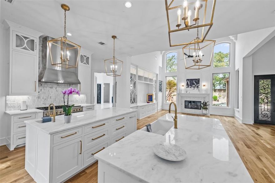 Absolutely Stunning! Impeccable, Complete Renovation! Situated in Trophy Club's most prestigious, gated neighborhood, The Knoll; nestled on majestic corner. Near 2 golf courses & country club. Beautiful transitional design with high quality appointments thru out, make this home one of the Top Luxury Properties available! Soaring ceilings, marble flooring, white oak wood floors, gorgeous ironwork, 2 staircases, 4 fireplaces, 5 bedrooms, 5 full baths, 2 half baths. 2 bdrms down, 3 up, all ensuite baths! Resort style primary retreat w sitting area, gas fireplace, luxurious bath; free standing tub, his & her closets. Chef's kitchen features gorgeous marble countertops, white cabinets, Monogram appliances, built in refrigerator, walk in pantry, 2 sinks, 2 dishwashers, butler's pantry, wine grotto! Media & game rm with room to expand in attic. Backyard Oasis boasts cabana w fireplace, kitchen, pool, spa, water falls. 4car gar, gated drive, large laundry room w sink and refrigerator space!