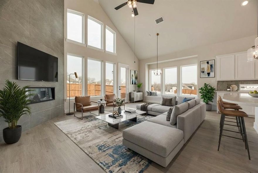 Welcome to this beautifully crafted, brand-new four-bedroom home in the desirable Providence Cove community JUST COMPLETED. Ideally located just off the Sam Rayburn Tollway, this home offers unmatched access to shopping, dining, and top-rated schools, along with neighborhood amenities including pickleball courts, a tranquil lake, and direct access to the McKinney Trail system. Step inside to a grand entryway highlighted by a dramatic curved staircase that sets a sophisticated tone. Formal living and dining spaces lead into a spacious family room featuring vaulted ceilings and a sleek linear fireplace with tile stretching to the ceiling. The open-concept kitchen is a chef’s dream, complete with a large island, slab countertops, Shaker-style cabinetry, premium stainless-steel appliances, a five-burner gas cooktop with custom vent hood, pots and pans drawers, a butler’s pantry, and a stylish picket tile backsplash. Energy Star certified for low energy bills. Upstairs gameroom & Media Room

Throughout the home, 8-foot interior doors, a modern front entry, rich wood floors, and a full oak staircase with wrought iron balusters enhance the sense of luxury. A private guest suite on the main level offers flexibility for visitors or a home office. The elegant primary suite includes a freestanding soaking tub, dual vanities, a walk-in shower with designer tile, and a spacious walk-in closet.

Upstairs, enjoy a versatile game room, a dedicated media room, a reading loft, and two additional bedrooms. Designed with comfort and efficiency in mind, the home includes a built-in security system, sprinkler system, tankless water heater, R-38 insulation, and Energy Star certification.

This home blends modern design with everyday functionality in a thriving, connected community. Don’t miss your opportunity to own this stunning new construction home.