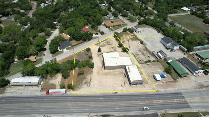 Hard to find industrial showroom commercial property in Weatherford.  
FOR SALE OR LEASE
10,136 sf warehouse with highway on 1.6 Acres Per Parker CAD
Approximately 2,500 sf retail up front (shell condition) plus 7,500 sf warehouse with up to 14’ clear height (varies)
5 oversize grade level doors, one of which has interior dock high loading and crane
270’ of frontage on Mineral Wells Highway and 250' on W Spring St at rear.  
High visibility elevated pylon sign
Large 1.597 acre gravel parking site has potential for heavy parking
New roof in 2021, recent exterior paint