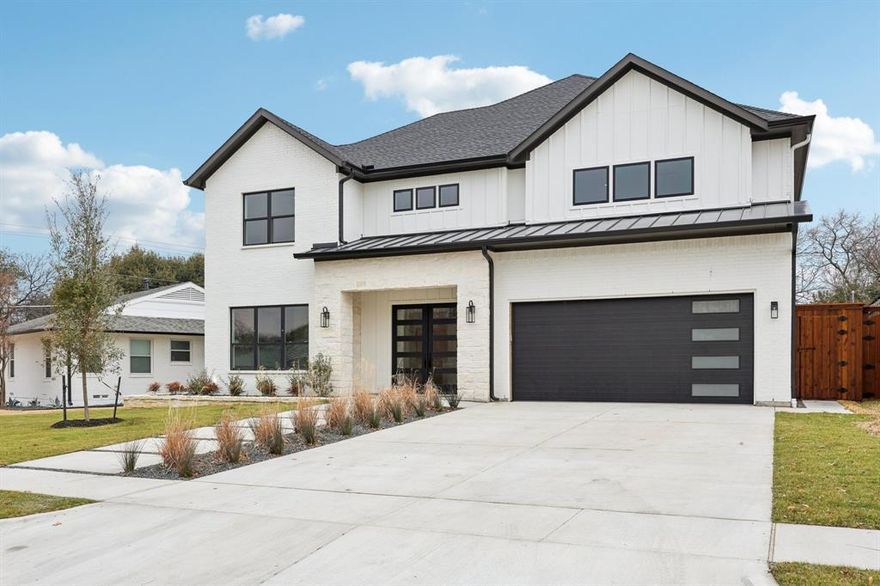 Located in the heart of Lake Highlands, this 4,850 sq ft custom home offers exceptional design, flexibility, and energy efficiency. Featuring 5 bedrooms, 5 full baths, and 1 half bath, the home welcomes you through twin 42 inch divided-light front doors into a custom-lit entry and private study with dedicated bath. The formal dining room showcases wainscoting and designer wallpaper. The expansive gourmet kitchen features double islands, quartzite countertops, custom soft-close cabinetry with functional built ins, and a premium appliance package including a 48 inch built in refrigerator freezer, two dishwashers, six burner gas range with griddle, double ovens, and pot filler. A large walk in pantry offers tailored shelving and a dedicated appliance station. The living room includes an electric fireplace and expansive sliding glass doors for seamless indoor outdoor living. The primary suite features custom lighting, a spa inspired bath with freestanding tub and rain shower, and a custom closet with built ins, safe, and direct utility room access. Upstairs includes a media room pre wired for sound and includes a wet bar, ice maker, and refrigerator; a large game room with flexible bonus space; four additional bedrooms; and three full baths, including a private two room suite with ensuite bath. Outdoor living features a covered patio with beadboard ceiling, ceiling fan, large format tile, and built in gas grill. Pool renderings available. Additional highlights include white oak wide plank floors, ceiling beams, solid core doors, custom trim, epoxy floored garage with storage, full yard irrigation with foundation watering, tankless water heater, dual zoned HVAC, and pre wiring for security and audio. Built to City of Dallas high standards with spray foam insulation, windows, impact resistant shingles, oversized gutters, and french drains to rear alley.