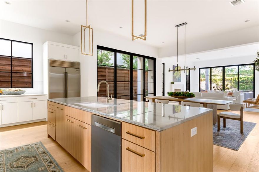 This newly completed home, finished in 2023, seamlessly blends modern features with timeless elegance, creating a truly luxurious living space. With 4,397 square feet of refined design, this residence is located in the prestigious Preston Hollow Village, offering easy access to an array of shops and restaurants within walking distance. Inside, the expansive downstairs living area is bathed in natural light, thanks to soaring 11-foot ceilings and floor-to-ceiling windows. The gourmet kitchen is a chef's dream, showcasing Wolf appliances, a Sub-Zero refrigerator, an ice maker, quartz countertops, and abundant storage. Adjacent to the kitchen is a private office perfect for a work-from-home lifestyle. Just off the living area, a gated side-yard provides the perfect space for outdoor living or pets. The primary suite is a serene retreat, featuring a luxurious ensuite bath, spacious closet, and dual vanities. Upstairs, you’ll find three additional bedrooms, each with its own ensuite bath, as well as a large living or media room designed for family enjoyment. This home truly offers an exceptional living experience!