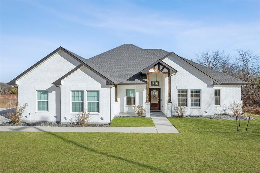 This stunning, sprawling one-story home sits on a generous half-acre lot and showcases exceptional quality, thoughtful design, and outstanding attention to detail throughout. Gorgeous curb appeal immediately sets the tone for what lies within. Inside, an open-concept floorplan is flooded with natural light and flows seamlessly, creating an inviting space ideal for both everyday living and entertaining.  At the heart of the home is a spacious living room highlighted by soaring ceilings and a cozy fireplace. The chef’s kitchen is truly a dream, featuring a large island with breakfast bar, custom glass-front cabinetry, and a wine refrigerator, all open to the living area for effortless entertaining. The private primary suite offers custom built-in cabinetry with shelving for added storage, a spa-like bathroom, and a generous walk-in closet.  Thoughtful extras can be found throughout, including a two-person sauna in the garage. Outdoor upgrades are equally impressive, with a 20’ x 12’ Tuff Shed complete with electricity, workbench, and concrete slab, plus an extended patio perfect for enjoying and entertaining outdoors. The extended driveway adds everyday convenience, while fresh sod, a full sprinkler system in both front and back yards, and low-maintenance river rock landscaping keep the exterior looking beautiful year-round. A lifetime playset adds a fun bonus for kids. As an added bonus, the Murphy bed in the playroom and the 2-person sauna in the garage will be staying with the house.  Schedule your private showing today and don’t miss the opportunity to own this incredible home.  Mortgage savings may be available for buyers of this listing.