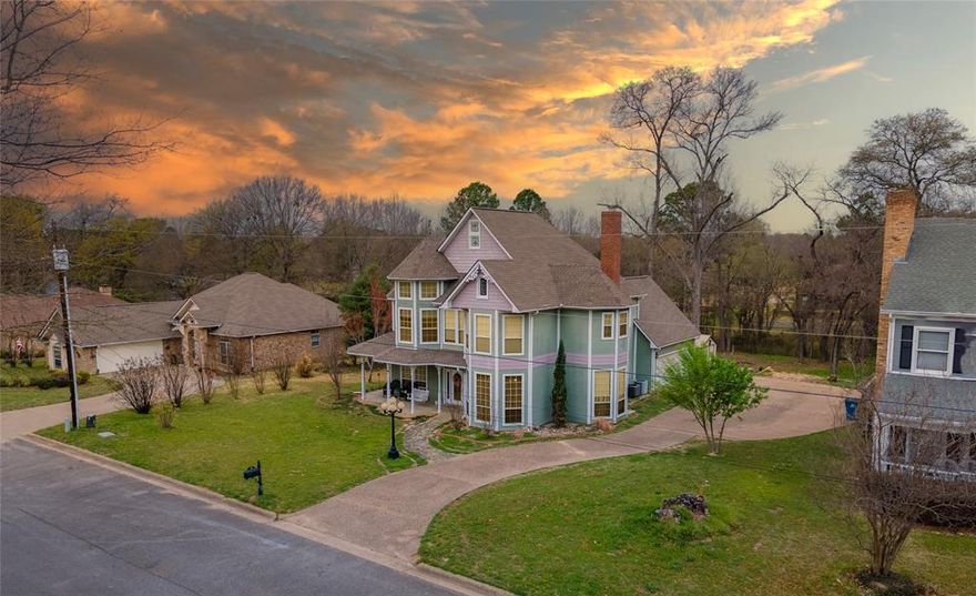 Perfect family home. Charming Victorian 2 story. Home has 4 bedrooms, 3.5 baths. Custom features are through out. Crown molding, rosette trim. Wooden staircase, wraparound porches. Large den with WBFP with gas starter. Beautiful cabinets in kitchen that features granite countertops and breakfast area. Formal dining off foyer plus additional room that could be game room or formal living. Separate office space. All bedrooms are upstairs. Master has sitting area. Double lavatories, large walk in closet in bath. Each bedroom has ensuite baths. Large room off of 4th bedroom could be 5th bedroom or game room. One bedroom features alcove and bay window and small balcony. Lots of storage through out. With zoned heat and air, abundant storage, and a wonderful location near shopping, parks, and lakes, this home combines timeless Victorian charm with everyday convenience.