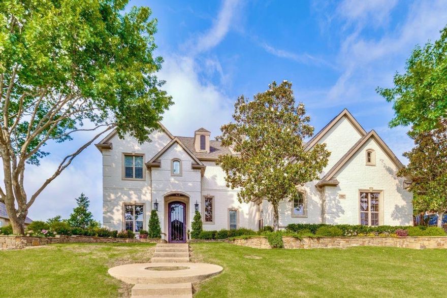 This luxury home is located on a perimeter lot and has been extensively updated throughout providing a timeless aesthetic meant to be relevant for years to come.  The updated exterior provides the curb appeal you desire with custom retaining walls and mature landscaping.  The backyard was designed to feel like a resort anchored by a beautiful custom dive pool with waterfalls, grotto, koi pond, and sun-deck.  Plus, a built-in kitchen, custom gas fire pit and plenty of entertaining space.  Once inside, you’ll see the same attention to detail with updated kitchen, large custom master closet, fresh paint, tankless water heaters, LED lighting, and more.