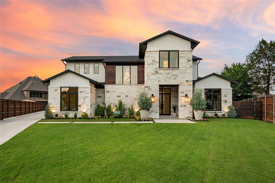 Quiet cul-de-sac in Prestigious Carroll ISD, this stunning V. Patrick Gray custom invites you into a lifestyle of elevated comfort & effortless indoor-outdoor resort-style living. Largest Lot in the Neighborhood. Soaring ceilings & wide-open areas flow seamlessly into the sprawling outdoor retreat. Double glass sliders, open to the expansive views & screened outdoor living space with outdoor fireplace, designed for family & entertaining! Enjoy grilling in the spacious outdoor kitchen w bar seating or relax in the sunken fire pit w travertine decking & lush native xeriscaping while listening to your favorite playlist on the outdoor sound system. Swim in the massive 45x17 deep-end pool or relax in the spa. Outdoor oasis also includes spacious turf area for loungers by the pool & expansive lawn space for play & entertaining. Inside, Refined, High-End Finishes Throughout. Kitchen boasts floor to ceiling cabinetry, Thermador Appliances, Walker Zanger Corcovado Quartzite countertops & scullery kitchen w 2nd dishwasher, sink, ice-maker & wine fridge. Kitchen has ample storage & counter space, perfect for entertaining. Smart layout incl a Flex Room off the kitchen that opens to the backyard. Two Bedrooms Down & Dedicated Office w Flr to Ceiling Custom Built-ins. Split guest suite w ensuite bath provides privacy & flexibility on the main level. Custom Library nook under floating stairs w a hidden shelf adds charm, flexible upstairs loft-style game room & 2 ensuite bedrooms provide space to grow & host. This flrplan allows for a fifth bedroom & bath addition if desired. Luxurious, Private master retreat features spa-inspired feel w dual shower heads & elegant Calcutta Gris Marble. Spacious custom closet offers storage & organization. Add luxuries & highlights: White Oak Flooring & Electric Shades throughout, Generous Mudroom, Laundry Room w a Sink & Built-in Desk, Auto Driveway Gate, Tankless water heaters, Epoxied garage floors w add'l space for storage & workout equipment.