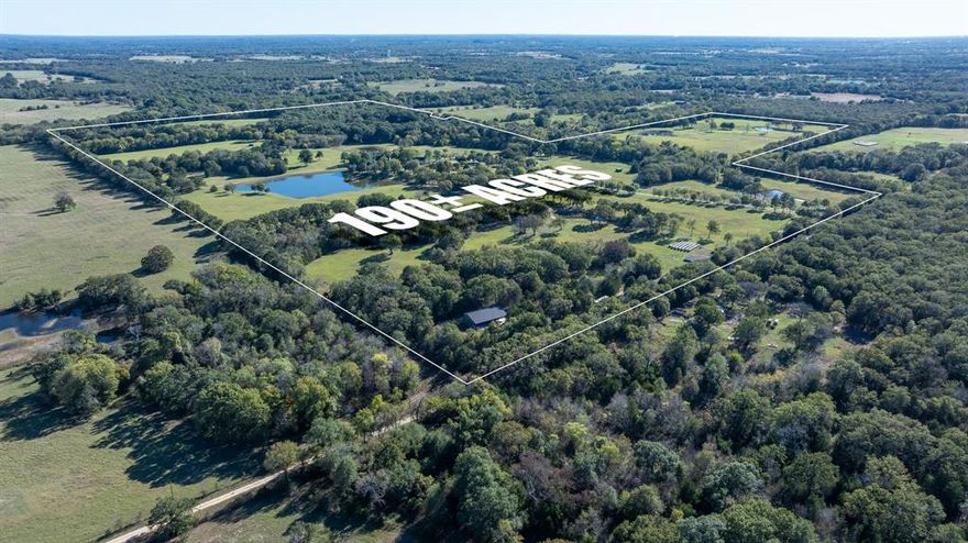 190± ACRES WILLS POINT, TEXAS VAN ZANDT COUNTY 1 HR FROM DALLAS COUNTRY ESCAPE FROM BIG D RECREATION, EQUESTRIAN HUNTING, FISHING, WILDLIFE SUBMIT FORM The Pharme is 190± acres of manicured land, stewarded by a love for nature and horses. The topography of this ranch is a mix of rolling grassland and maintained forest. The homestead is rich in history and character with its two original wooden cabins and boasts a 5,600 square-foot home with 4 bedrooms and 4.5 bathrooms, a shop with significant storage, an equipment shed, and stunning mature pecan trees. There are 9 ponds throughout. The property has previously been used for horse breeding and as a peaceful family getaway but is very versatile in its makeup.