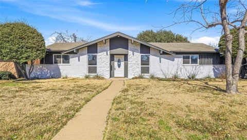 Photo of 1813 Crockett Street, Garland, TX 75042 (MLS # 21306889)
