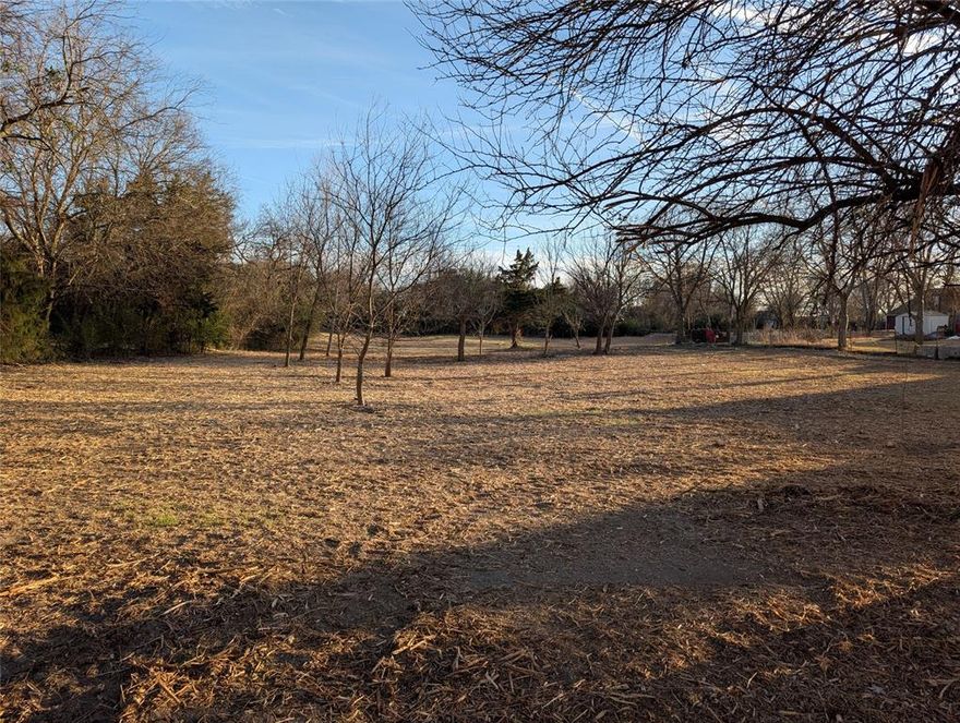 The Subject 1.953 acre tract is located JUST WALKING DISTANCE from Van Alstyne's thriving downtown Social District and HAS FRONTAGE on both E. Fulton and Sherman Streets.  The Subject tract is presently zoned SF-65.  Huge selling point here - this tract is OPEN TO MULTIPLE USES AND CONFIGURATIONS - as a LARGE SECLUDED FAMILY ESTATE close to town, SEVERAL LOTS for a family enclave, or a close in SUBDIVISION WITH MULTIPLE LOTS.  In fact, the City has favorably reviewed preliminary plans for a six (6) lot subdivision on the site, but a FINAL PLAT has NOT BEEN SUBMITTED as yet - so the BUYER HERE is open to working with the City to formulate a final plan that best works for the BUYER on an SF-65 zoned tract.  The Subject tract was recently cleared and contoured, so this tract is ready for development.  This tract has frontage ON BOTH FULTON AND SHERMAN STREETS, with 152 feet on Fulton and 206 feet on Sherman, for total road frontage of 358 feet.  These tracts DON'T COME to the market often, a developable tract with SF-65 zoning SO CLOSE to Downtown and Van Alstyne's Social District - a tract that's available as a SINGLE FAMILY ESTATE, a FAMILY ENCLAVE, a SUBDIVISION, or anything that SF-65 zoning allows.  With the clearing work already done, this tract could likely get through final City approvals and be ready for development in 60-90 days.  The Subject tract HAS NOT been in Ag Status for several years, so no large tax rollbacks will accrue to the Buyer.  Please be advised that all statements contained herein HAVE BEEN DILIGENTLY RESEARCHED AND ARE BELIEVED TO BE FACTUALLY CORRECT.  However, the Buyer and Buyer's Agent WILL NEED AND WANT TO VERIFY ALL STATEMENTS contained herein as a matter of DUE DILIGENCE to confirm their complete veracity.