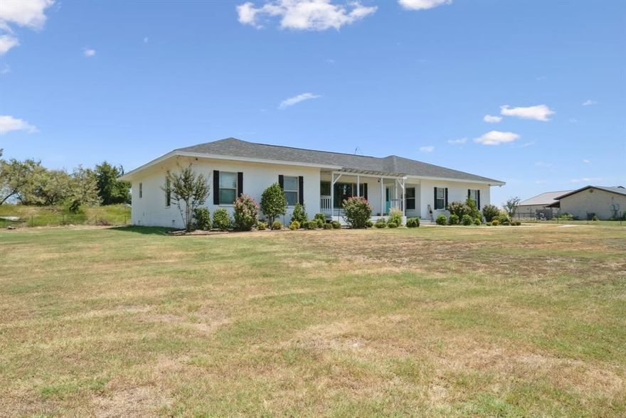 Looking for your dream home???? You have found it in this piece of Texas.  Perfectly located between Dublin and Stephenville. This home offers plenty of room to grow or spread out. 6 bedrooms and 3 baths on 5+ acers is perfect for a large family or a growing family looking for a little slice of country all to yourself. Property has original hardwood floors, a large living room, good size bedrooms, and big kitchen-dining area. New paint inside and out. The yard is enormous with lots of St Augustine grass and a new sprinkler system. The stock tank behind the house is perfect spot to hang out, fish or for your livestock to drink. This property is perfect for those seeking a get away from the hustle and bustle of town without a long drive. Don't hesitate to look at this one.