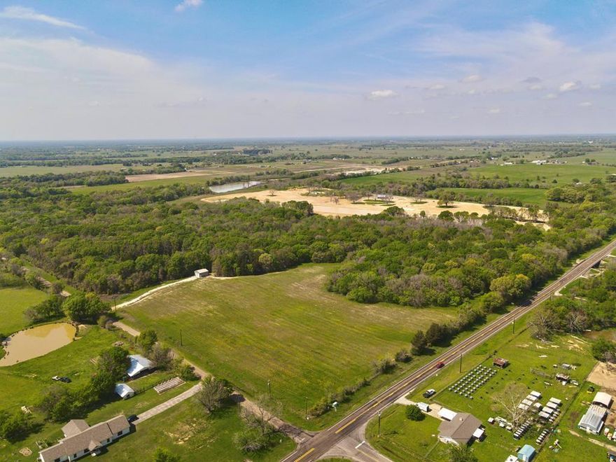 56 Acres of Serene Wooded Beauty in Van Zandt County. 
Discover the perfect blend of tranquility and convenience on this breathtaking 56-acre property, featuring frontage on VZCR 2801 and FM 316. Located just minutes from Mabank and Canton—and only an hour from Dallas—this property offers an elevated homesite with stunning views of lush timberland and abundant wildlife.
This natural paradise is rich with hardwood trees, a meandering creek ideal for hunting and wildlife watching, and three serene ponds. Nine acres of open space provide the perfect setting to build your dream home, while the wooded landscape is perfect for trail walking and ATV riding.  Currently under AG with Wildlife Exemption and situated in the Wilcox Aquifer district, the property is already equipped with underground utilities and a power source, adding to its potential. A newly constructed 30x40 metal building with roll-up doors offers the perfect opportunity for a Barndominium conversion or RV storage while you build.  Don’t miss out on this one-of-a-kind opportunity! An assumable loan with a low interest rate is available for qualified buyers. Call today for more details!