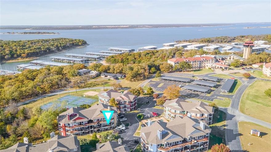 Beautiful Fully Furnished Lake Texoma Condo! This updated 2-bed, 3-bath second-floor condo offers effortless resort living just steps from the community pool and minutes from the shoreline of Lake Texoma. Light, bright, and move-in ready, the home comes fully furnished, making it perfect for a weekend getaway, full-time lakeside living, or a turnkey short-term rental. Enjoy an open-concept living area with plenty of natural light, a well-appointed kitchen, and two spacious ensuite bedrooms for privacy and comfort. The oversized balcony provides a relaxing spot to enjoy treetop views and the peaceful lake atmosphere. Located in the highly desirable Tanglewood community, you’ll love the easy access to the marina, lake activities, tennis, dining, and the resort amenities nearby. Nearby attractions include Island Restaurant Bar & Grill, Schooners Coffee & Breakfast, and you’re just minutes away from the upcoming Margaritaville Resort! Low-maintenance living in a quiet, scenic setting — your Lake Texoma retreat awaits!