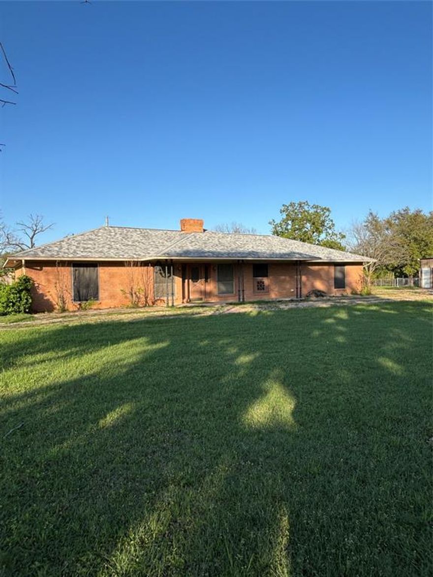 Idealic country place. Make it your own. Beautiful 6.02 acres with an exceptionally picturesque pond surounded by Weeping Willow, pecan and oak trees. This contemporty all brick home has a great floor with delightful natural scenes. Spacious 3 bedrooms, 2 full baths and a large utility room adding more storage and work spece.  Family room has a cozy brick fireplaceand  game room enough for plenty of indoor activities and additional access from the home through French doors. This oversize game room has central HVAC & picturesque antique looking stove. Shop is 1600 square feet built later.  Expansive concrete drive up to and home and covers area between home and building, makes into a great basket ball court . Features within this shop include room for 2 vehicles and the RV space with clean out into septic, 30 amp electric service and water. RV depth and height or keep your boat out of the weather.  Fenced, cross fenced. cattle pens, stable & barn.  Add horses, chickens, even honey bees are welcome to round out this ranchette. Interior of this well built home shares the decorating of prior years it will easily be revived with todays latest trends to be your show place. The front yard has interesting wading splash feature, the circulating pump no longer functions and will need replacement to return to the cooling experience it can be. Interior of this well built home shares the decorating of years past and will beautifully respond to the colors and style of today. 5 minutes to Lake Whitney, Parsons Marina, Loafers bend park and boat ramp and Whitney Dam.  Only 35 minutes to I-35 and Hillsboro, 40 to Waco and an easy drive to the DFW Metroplex, and greater Austin area.
Make arrangements to view this property. You may find it checks all your boxes and even some you didn't have.