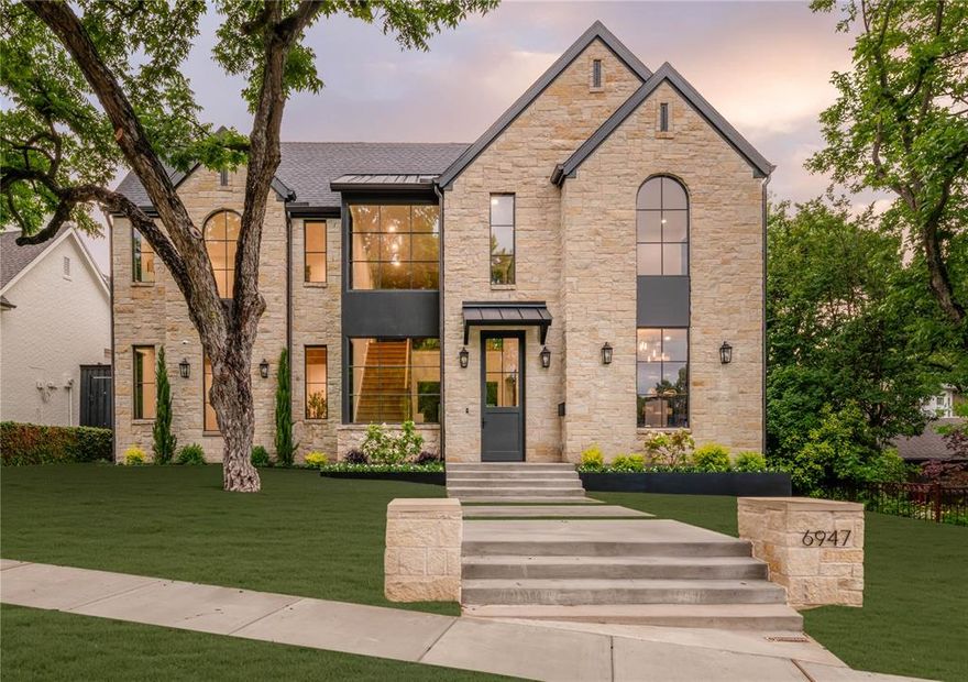 Completed in 2026 by Stainback Construction and zoned to Lakewood Elementary, this exceptional residence blends timeless design with elevated modern living. Thoughtfully designed with both everyday comfort and effortless entertaining in mind, the home showcases refined craftsmanship throughout, including Pella windows and doors, 9” wide-plank real hardwood floors, white oak stained inset cabinetry with soft-close features, and designer lighting and tile selections.
At the heart of the home is a beautifully appointed eat-in kitchen featuring Taj Mahal quartzite countertops, a Wolf commercial range, built-in SubZero refrigerator, and Scotsman ice maker. A fully equipped butler’s pantry adds both style and functionality with a built-in Miele coffee maker, Wolf microwave, wine refrigerator, and prep sink. Smart home features are seamlessly integrated through the Brilliant Smart Home System, allowing control of lighting, thermostats, speakers, and shades throughout the home. The downstairs primary suite serves as a peaceful retreat with electric window shades, dual vanities, a soaking tub, stand-alone shower, California Custom Closet system, and stackable washer and dryer hookups for added convenience. Additional downstairs amenities include a private office with custom built-in cabinetry, while upstairs offers expansive additional living spaces including a spacious game room and dedicated workout room. Designed to embrace indoor-outdoor living, the covered patio overlooks a fully turfed backyard complete with sprinkler system and board-on-board privacy fence. Additional highlights include an oversized two-car garage with epoxy flooring. Ideally located within walking distance to Lakewood Park, White Rock Lake, and Lakewood Elementary, this home offers a rare combination of luxury, functionality, and an unbeatable Lakewood lifestyle.