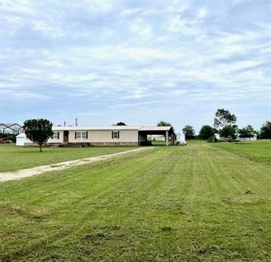 Nice, 4. 2 home on a large 1.47 acre lot located in the popular Tigertown & Sumner area and Chisum ISD. There have been some recent updates including new paint and floor covering. All rooms are of good proportions with a split master suite. This home is perfect for a large family or entertainment. The kitchen has an abundance of cabinets and countertop space including a large breakfast bar and prep island, and a separate dining room. There are two pantries and ample space for an extra fridge and freezer. Outside is a large 27 x 10 open deck, two covered decks (26 x 15, 17 x 15) and a 33 x 15 covered patio. In addition, there is a 19 x 44 attached carport and a 20 x 12 detached shop with a 4 x 12 covered porch. This property has lots of room for a garden or two and plenty of space for the kids and pets. A good place to call home.