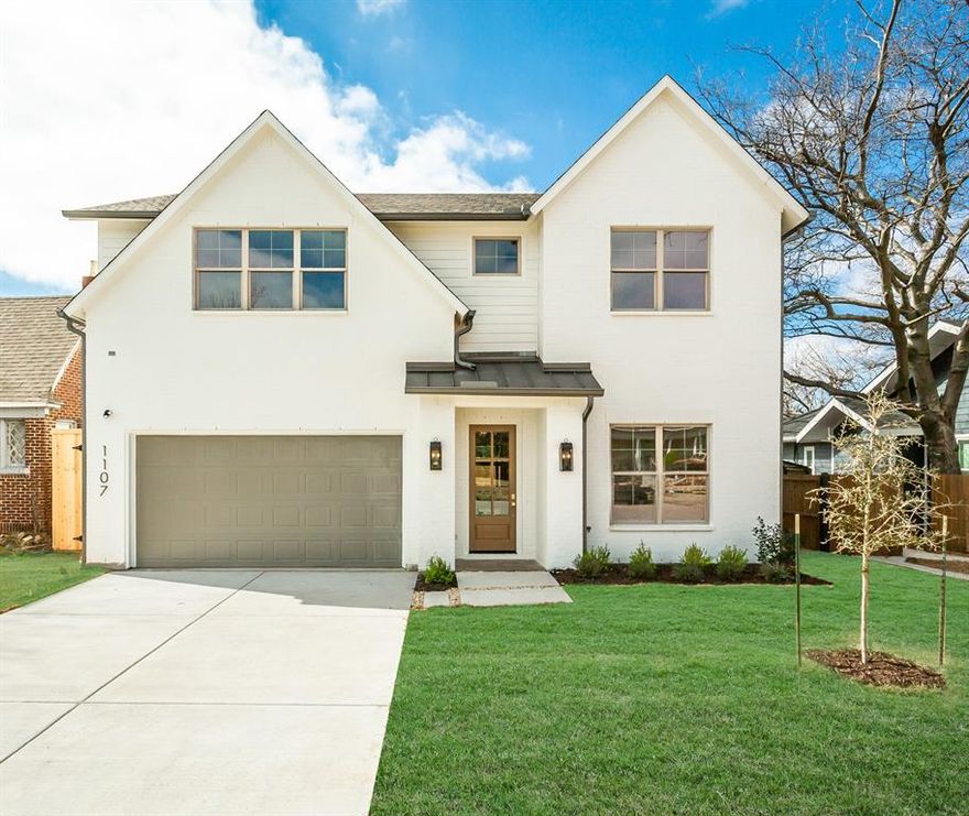 1107 Mount Auburn is a perfect blend of modern design and functionality, offering 3,128 square feet of luxurious living
space. The exterior features a classic painted white brick facade with a welcoming covered entrance. Inside, the
chef’s kitchen stands out with custom cabinets reaching the ceiling, a striking white oak island, quartz countertops, and
high-end Kitchenaid appliances. The open living area boasts a stunning fireplace surrounded by custom quartz, ideal for
cozy evenings. A versatile downstairs flex bedroom doubles as a home office, while the mudroom and pantry provide
practical storage off the garage. The bathrooms are elegantly appointed, including a custom vanity in the guest bath
and a spa-like primary suite with a freestanding tub, walk-in shower, and dual vanities. Pella windows invite natural
light, while Visual Comfort lighting enhances the home’s aesthetic. Upstairs, a game room with a bar creates a perfect
entertainment hub. The property features a large backyard with professional landscaping, a multi-zoned sprinkler
system, and a privacy fence. With a modern layout and thoughtful details throughout, this
home delivers both style and comfort.