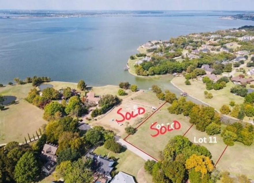 REDUCED $200K-DOCKABLE 1 AC+ WATERFRONT HOME SITE ON LAKE RAY HUBBARD with TREES! Situated in a cove just off of the OPEN WATER in Heath's Meadow Lake Village. Surrounded by MULTI-MILLION $$ ESTATES! Approx. 1.5 AC of usable land with the leasable take line (approx .5 AC, take line)  Lake front opportunities in HEATH are VERY RARE. Property located 4 miles from I-30, 9.5 miles from George Bush Frwy, 26 miles from DT Dallas and 46 miles from  DFW Airport. Build now or later & chose your own builder. Owner is in process of getting excavation company to bid pad site for property. NO HOA.