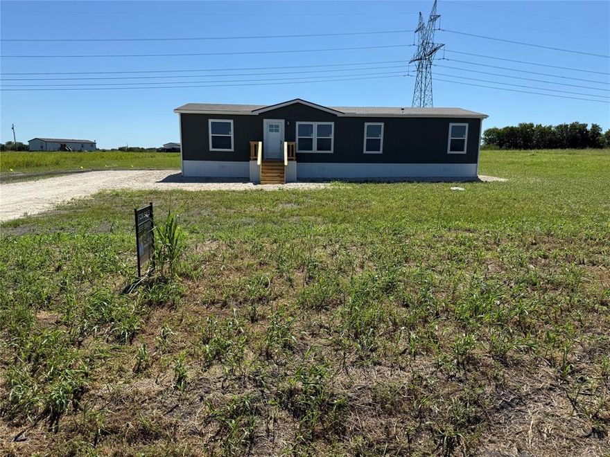 Brand New installed Clayton Boone double wide with 4 bedrooms and 2 bathrooms.  Photos are of previously sold home-colors may vary.  At asking price, seller to pay up to $8,000 in buyer lender and closing fees.
