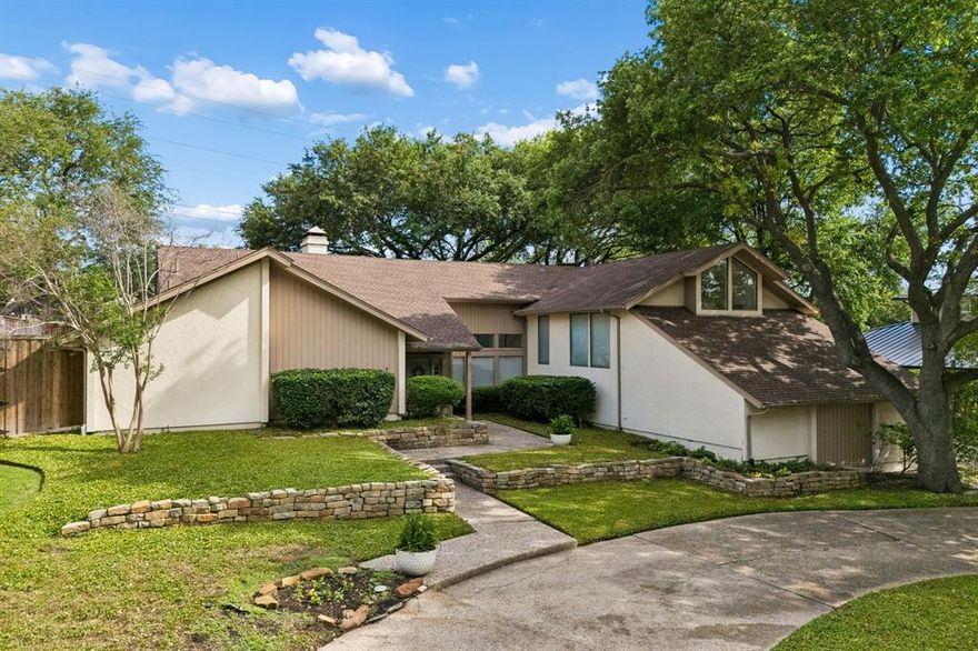 Contemporary home nestled beneath mature trees in a highly desirable Oak Highlands neighborhood feeding into award winning Moss Haven Elementary. This light-filled residence offers soaring ceilings, expansive windows, and a versatile open layout designed for comfortable living and entertaining. The spacious primary suite is a true retreat featuring vaulted ceilings and beautiful new wood floors.  The bright kitchen showcases granite countertops, abundant cabinetry, stainless steel appliances, and a sunny breakfast area overlooking the yard. Each bedroom includes en suite bathroom, and the bonus seperated living area includes a full bath. Circular drive out front for extra parking as well as a three car garage. 
Outside, enjoy exceptional curb appeal with terraced stone landscaping, a welcoming front entry, and lush grounds. Enjoy the spacious turfed backyard with mature landscaping. Multiple living spaces, and abundant natural light throughout. Updated carpet, hardwoods, paint, west side AC, and much more.