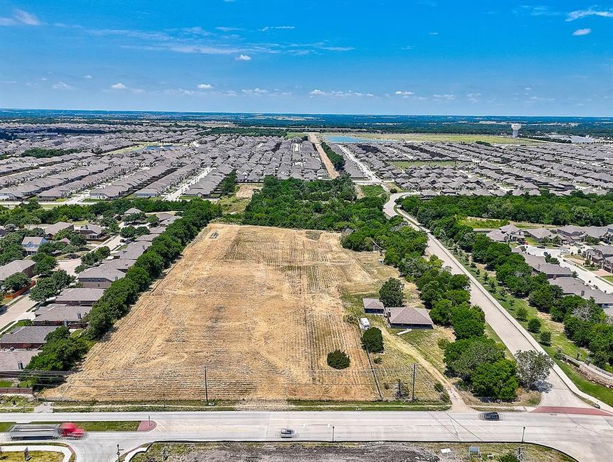 Here is the opportunity to own a premier development site in one of the Dallas-Fort Worth metro's most prominent growth areas. This is a 14.831 acre property that is situated prominently at the intersection of Milrany Lane and Gray Wolf Drive. Any future development will be a possibility with already established residential neighborhoods surrounding this large multi acre tract replete with a home and barn already on the property. This shovel ready land offers two streets of frontage and has a community walking path developed on both sides adjacent to the back lot line. This dynamic location offers an array of opportunities for multiple homes to be developed or the opportunity to build your dream home with acreage within easy commuting distance from Dallas and surrounding cities. The creek winding through the property provides a tranquil oasis to relax and enjoy the serenity of nature on your own land. This property has it all! Do not miss your opportunity to own this!