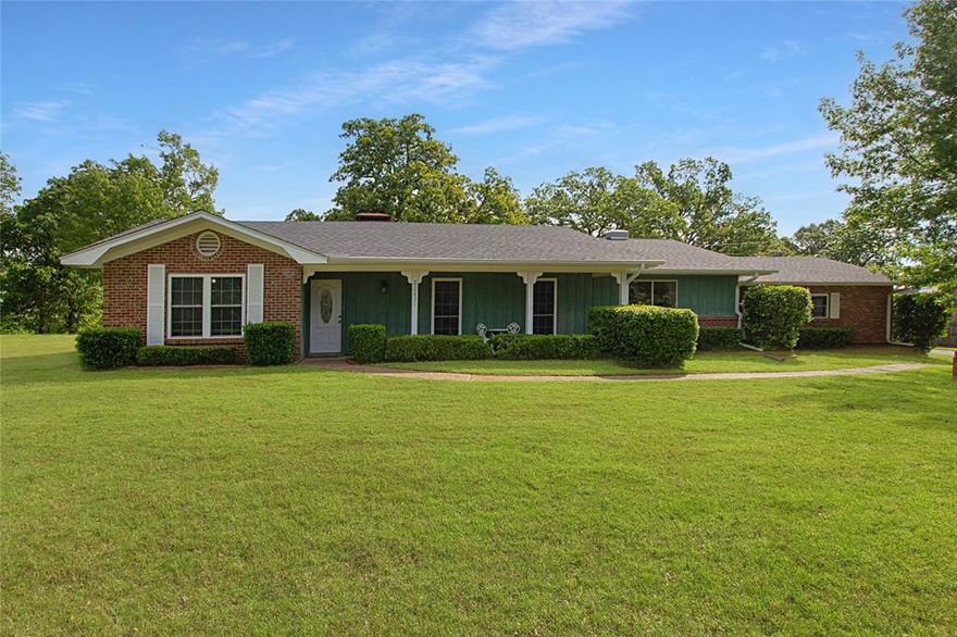 Welcome to this spacious 3-bedroom, 2-bath home offering 2,738 square feet of comfortable living space with a 3-car carport, all set on 3.860 beautiful acres in Bullard. With a large yard, whole-house generator, bonus and or game room, and thoughtful features throughout, this property offers the space and flexibility to truly make it your own.

As you arrive, you’re greeted by a wide-open front yard that sets the tone for the property’s peaceful setting. Inside, the home features two separate living areas, giving you plenty of room to spread out. The main living area is spacious and centered around a beautiful fireplace, while the second living area offers a cozier feel with a brick-surround fireplace—perfect for relaxing or entertaining.

The kitchen is impressively sized and can easily double as a dining space, offering abundant cabinet storage and plenty of room for gathering. All bedrooms and bathrooms are nicely sized, providing comfort and versatility. The primary suite is especially roomy, featuring direct access to the backyard and an ensuite bath with a separate shower and soaking tub.

Step outside to enjoy a covered back patio overlooking a large backyard with plenty of room to roam, play, or host gatherings. The property also includes a storage shed for added convenience.

With its acreage, multiple living spaces, and standout features, this home is a great opportunity to enjoy country living with room to grow.